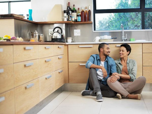 happy couple in new kitchen